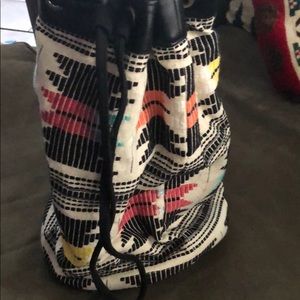 Side hang one strap backpack